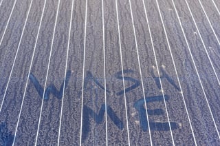 Dirty solar panel with dust buildup